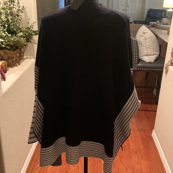 Great black poncho w/slits on sides & black & cream striped bottom & sleeves. - Picture 4 of 5